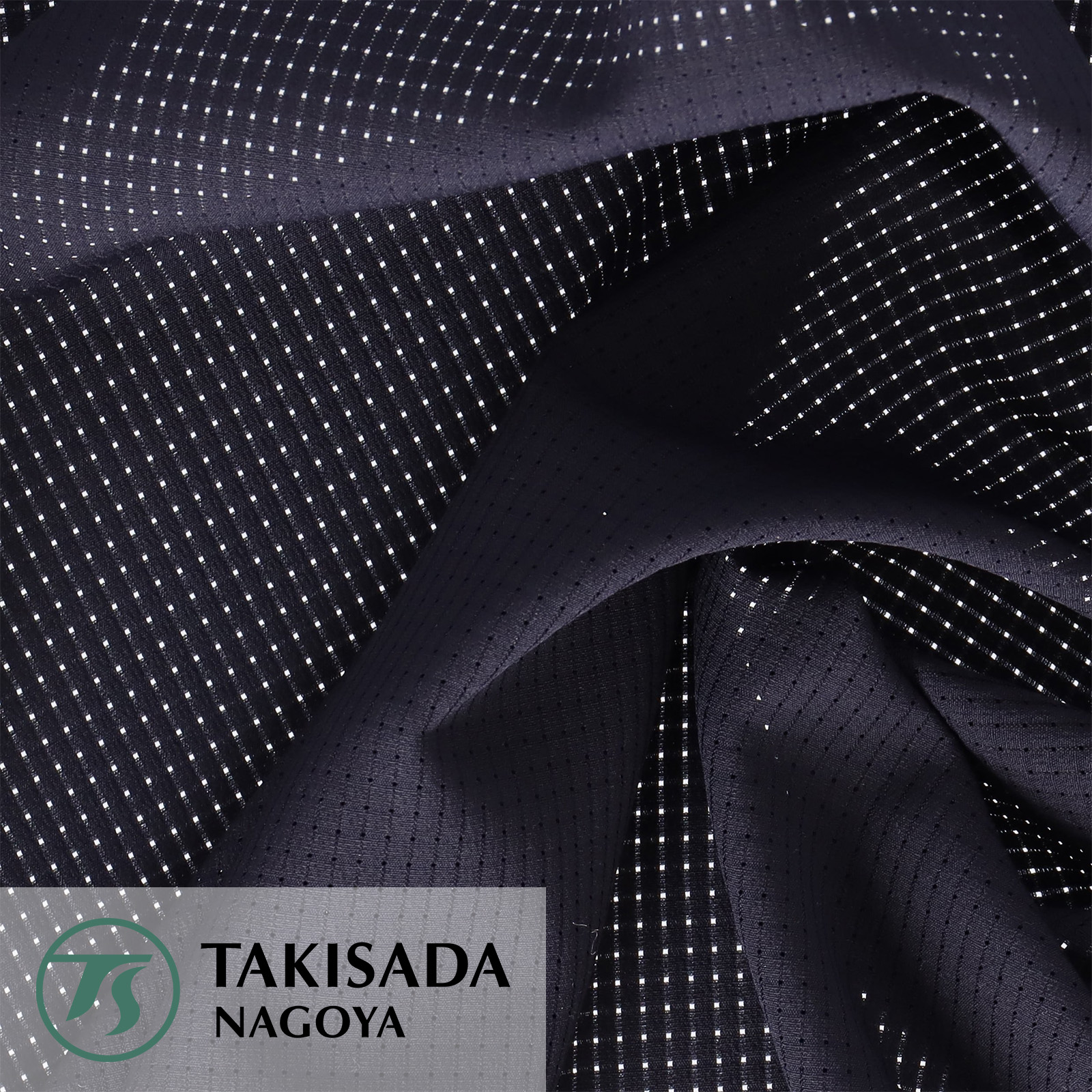 1038400 ムービングツイル生地